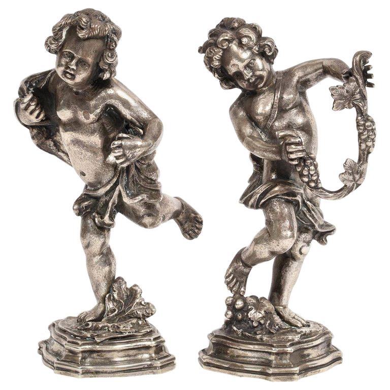 Mario Buccellati, a Pair of Sterling Silver Figures of Playful Children Cherubs