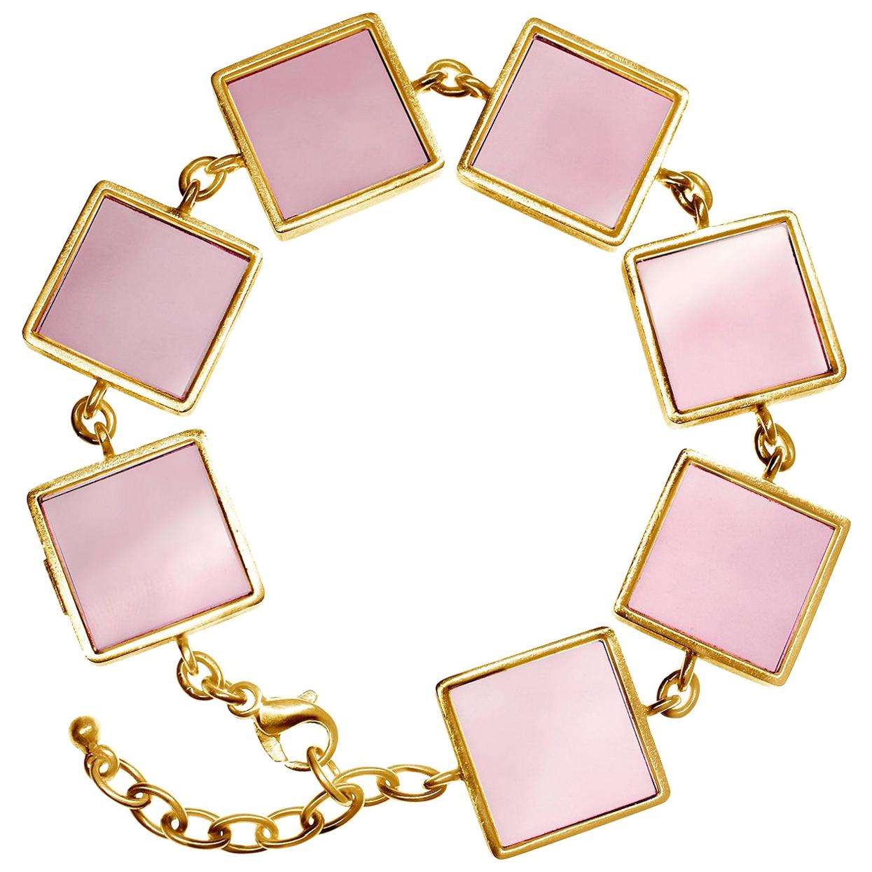 Bracelet contemporain à l'encre plaqué or rose de l'artiste avec onyx rose