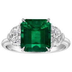 Vintage 2.77 Carat Colombian Green Emerald and Diamond Three-Stone Engagement Ring