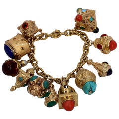 Retro Gold Charm Bracelet with Eleven Charms with Assorted Stones