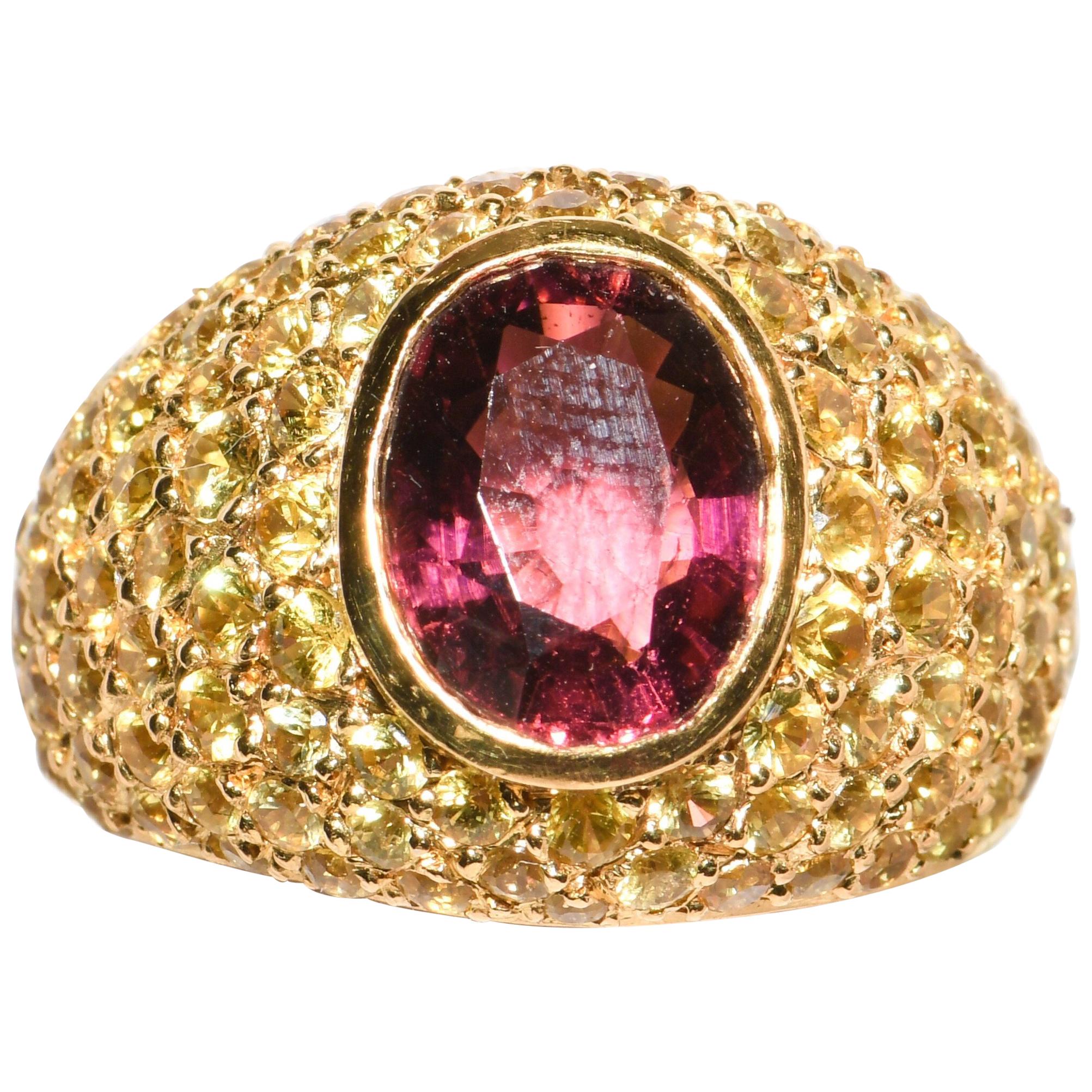 18 Karat Gold Dome Ring with Oval Pink Tourmaline and Pave Yellow Sapphires For Sale