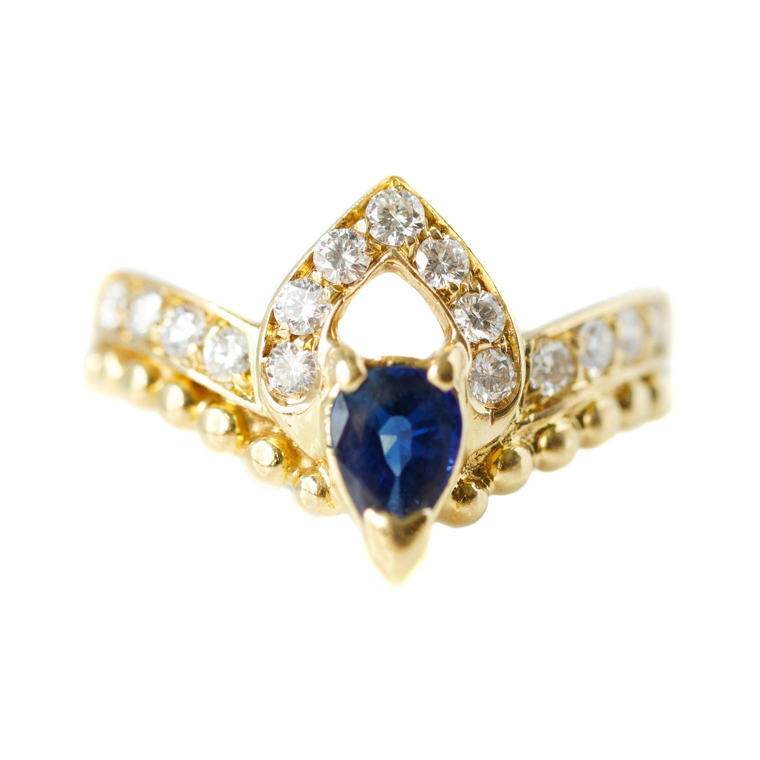 0.75 Carat Diamond and Sapphire 18 Karat Yellow Gold Ring