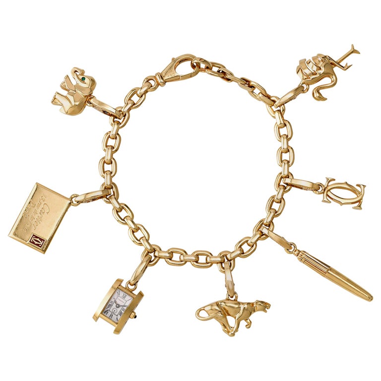 Cartier 18 Karat Gold Charm Bracelet at 1stDibs