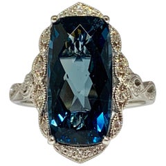 14 Karat White Gold 6.90 Carat Blue Topaz and Diamond Cocktail Ring