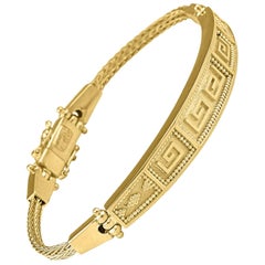 Georgios Collections - Bracciale in oro giallo 18 carati con design a chiave greca e corda Bangel