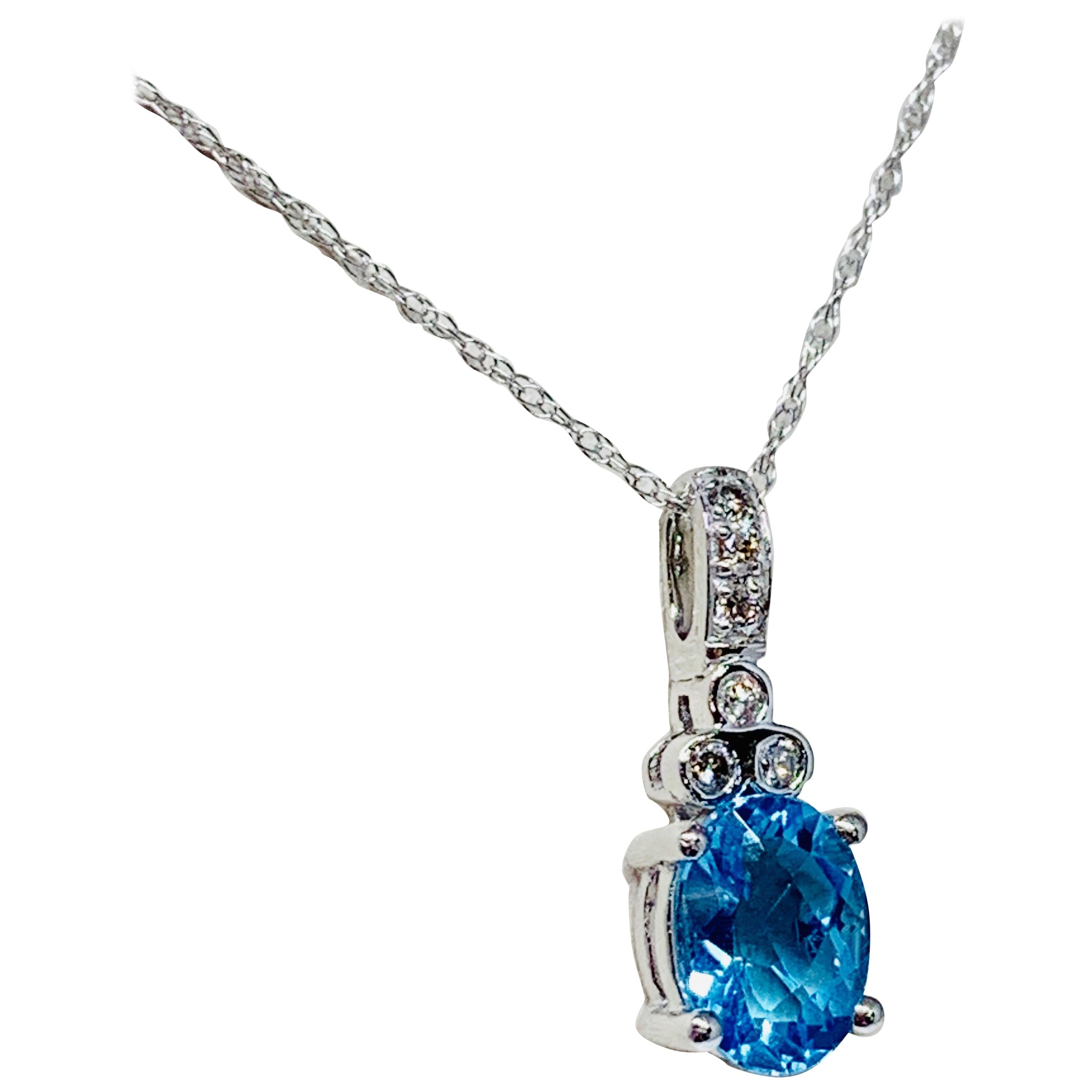 10 Karat White Gold 1.35 Carat Total Weight Blue Topaz and Diamond Necklace