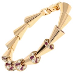 Retro Rose Gold Diamond and Ruby Peek-a-Boo Bracelet, circa 1950s