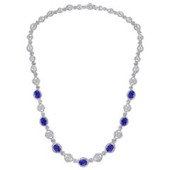 11 Carat Oval Tanzanite and 12 Carat Diamonds Necklace 18 Karat Gold Estate