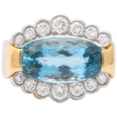 1950s High Quality Scissor Cut Oval Aquamarine with Diamonds Gold Band Ring