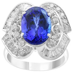 5.38 Carat Oval Tanzanite and Diamond Ring 18 Karat White Gold, Estate