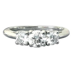 Tiffany & Co. 3-Stone Platinum and Diamond Engagement Ring .84 Carat H VS1/VS2