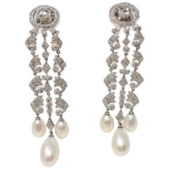 White Round Brilliant Diamond And White South Sea Pearl Earrings In 18k Gold.