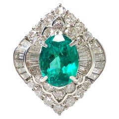 Emerald Oval and White Diamond Cocktail Ring in Platinum