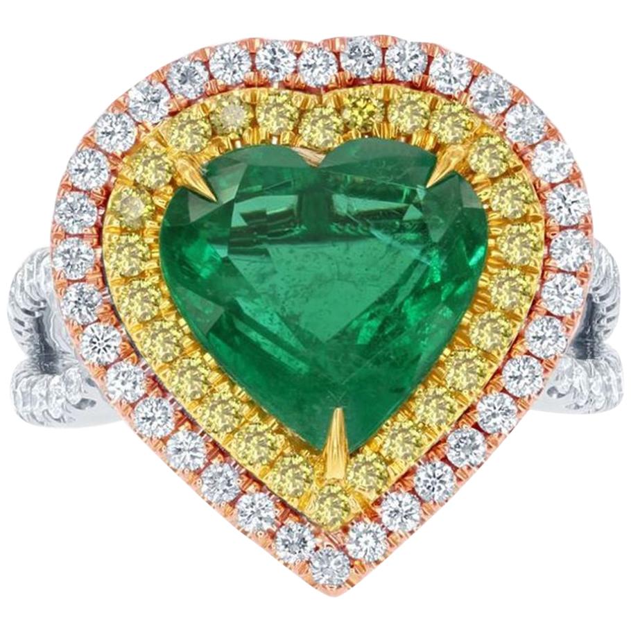 Halo 9.33 Carat Emerald Heart Shape Diamond Three-Stone 18 Karat White Gold Ring For Sale