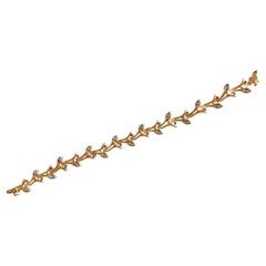 Tiffany & Co. Pulsera de Oro Amarillo de 18 Quilates, Platino y Diamantes Forma de Ramita