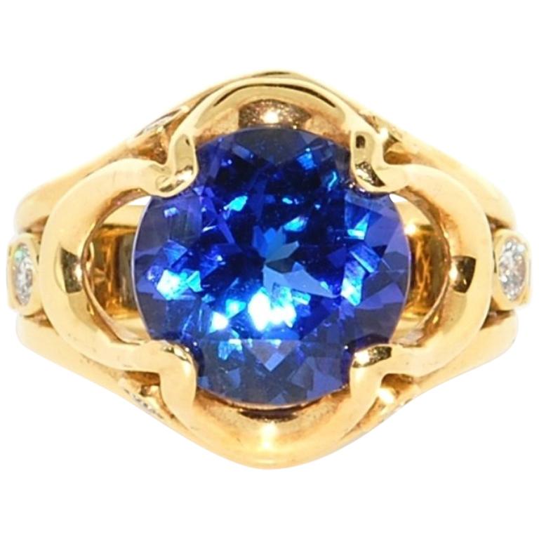 AAA Quality Very Fine Tanzanite in 18 Karat Yellow Gold with Diamonds Accents For Sale