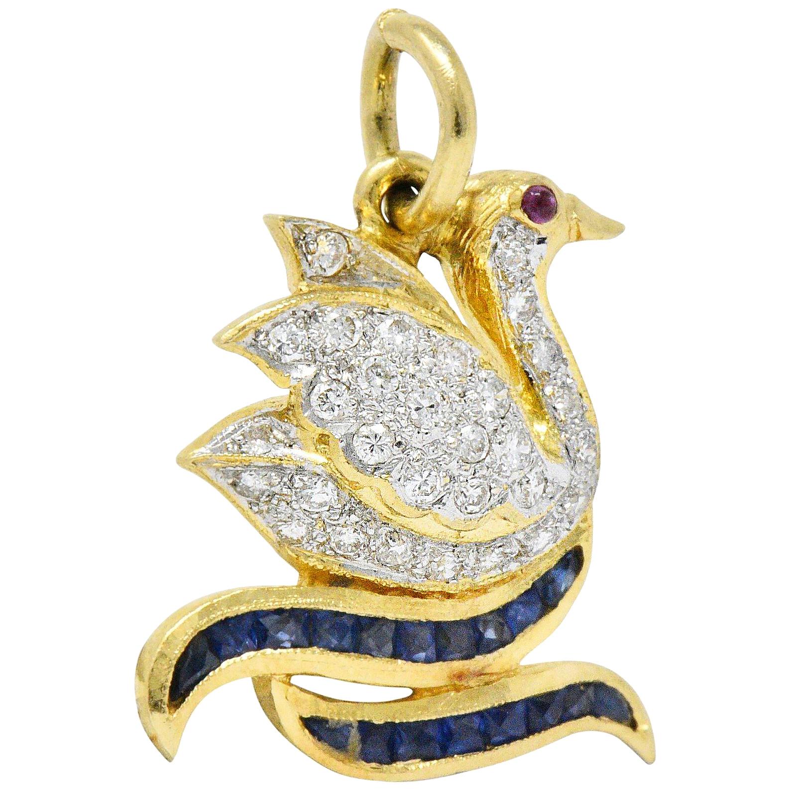 Circa 1980s Vintage 0.40 Carat Diamond Sapphire Ruby 18 Karat Gold Swan Charm