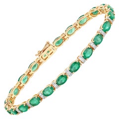 9.68 Carat Zambian Emerald and Diamond 14 Karat Yellow Gold Tennis Bracelet