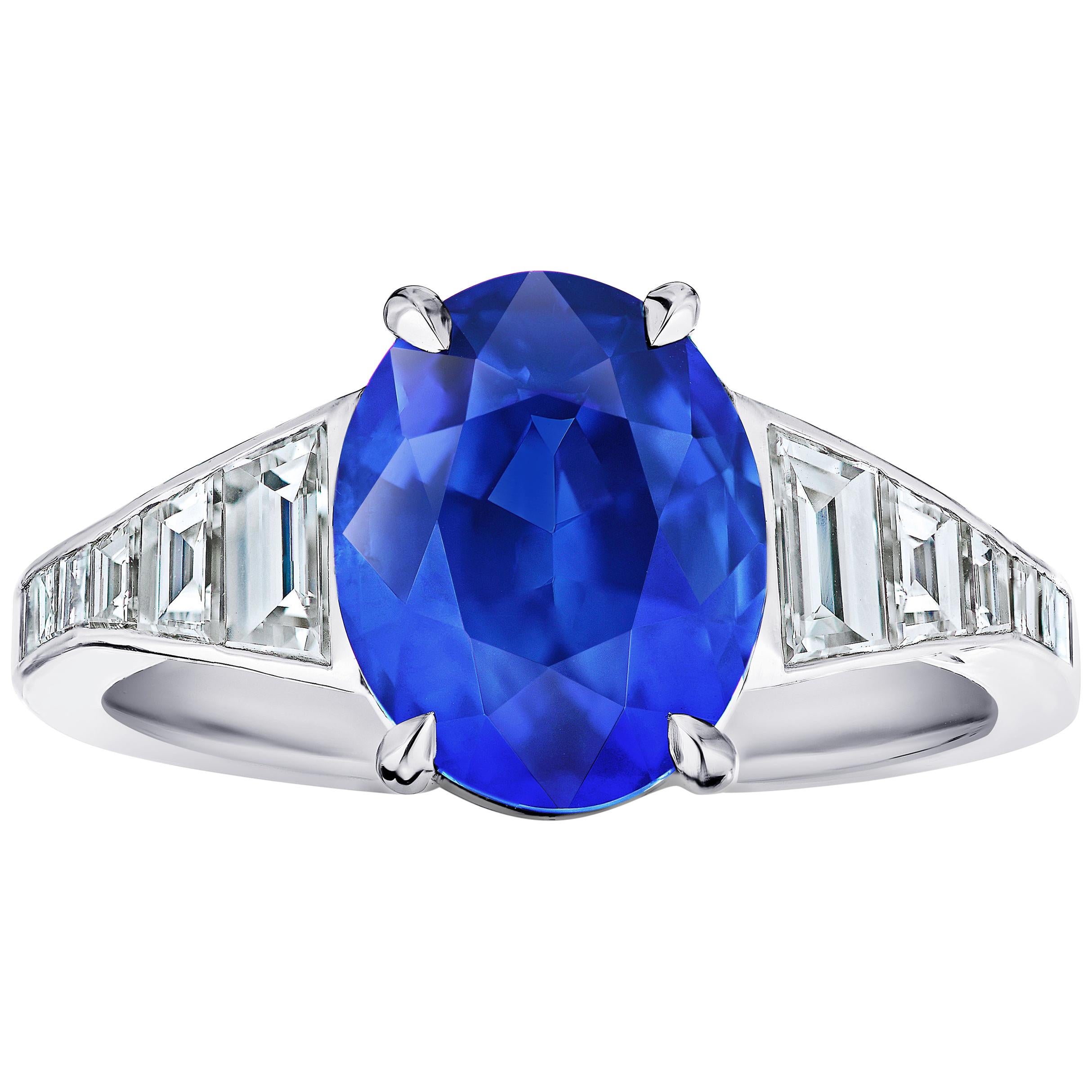 4.91 Carat Oval Blue Sapphire and Diamond Ring