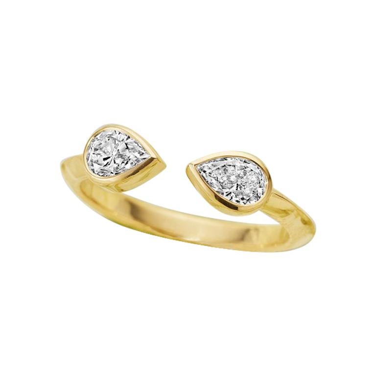 Pear Diamond and 18 Karat Gold Engagement Ring