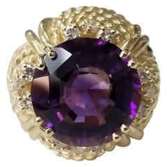 14 Karat Ring mit Amethyst und Diamant