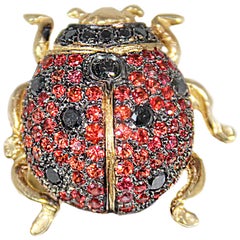 Gold Ladybird Ring with Black Diamonds and Red Sapphires