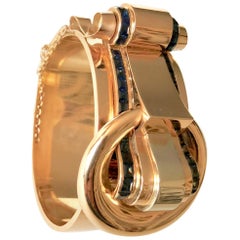 Tank Bracelet circa 1940 Rigid Opening Buckle Pattern Gold 18 Carat Sapphires