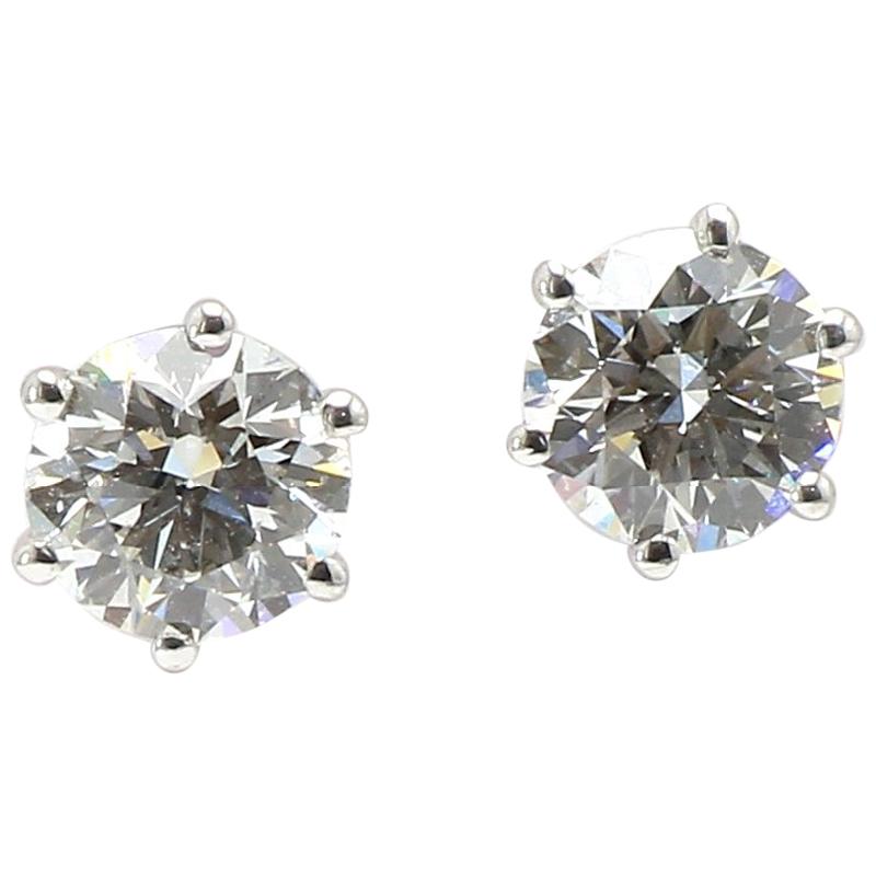 A Classic Shimansky Diamonds Studs Solitaire  Earring in 18K White Gold  For Sale