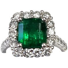 Platinum Emerald Cut Emerald and Diamond Ring