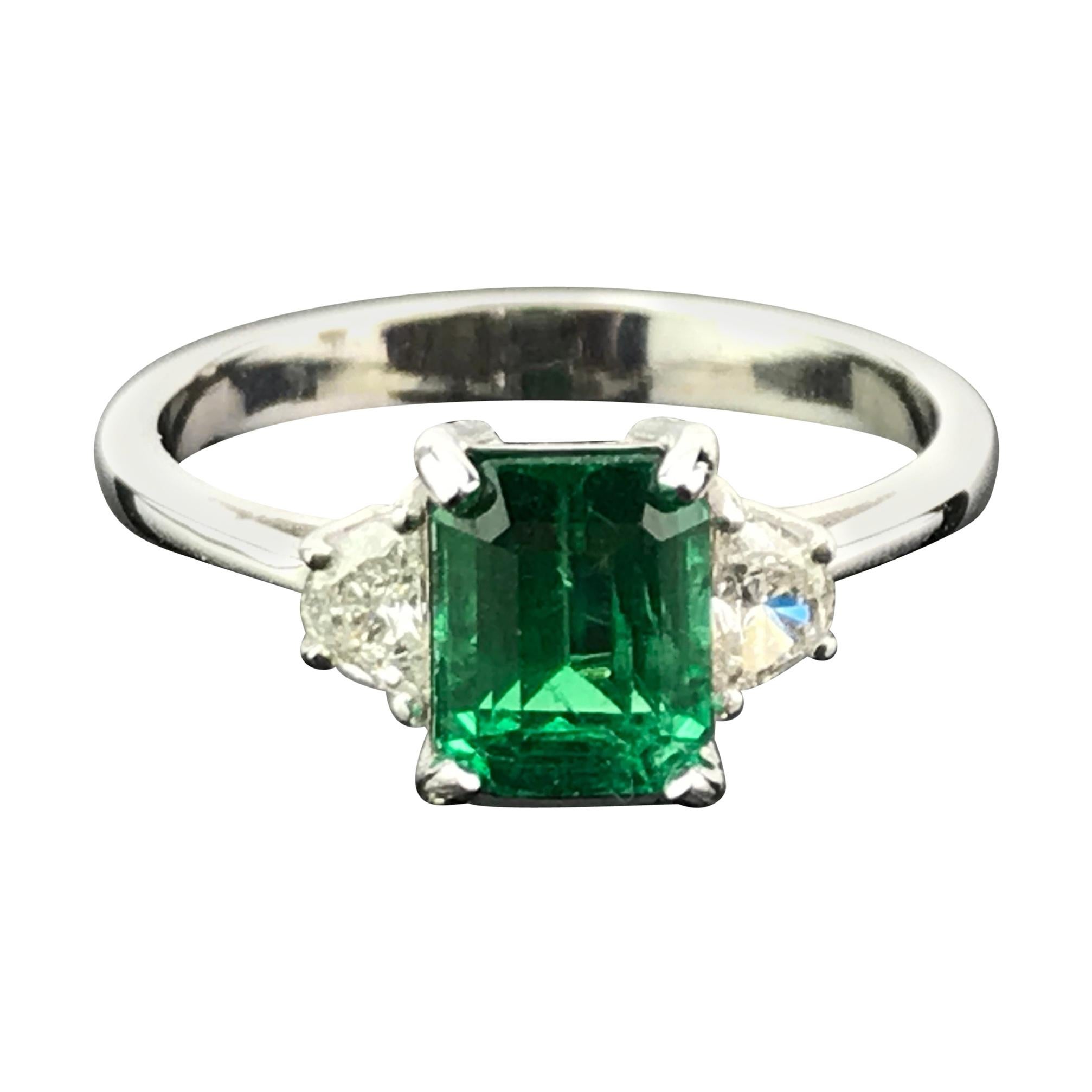 1.48 Carat Emerald and Diamond Three-Stone Engagement Ring at 1stDibs