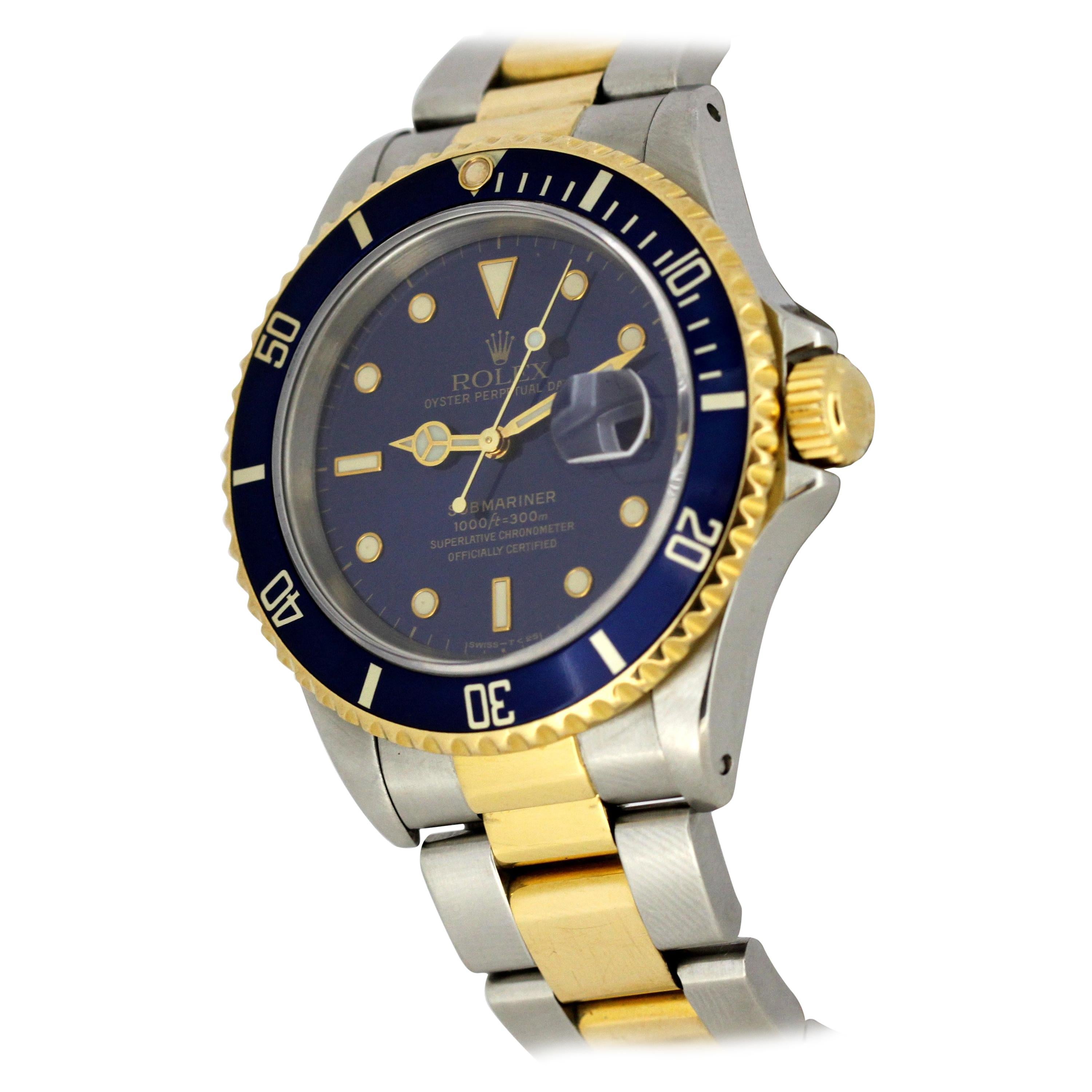 18 karat gold rolex submariner