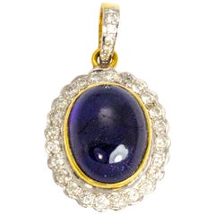 Pendentif vintage en or 18 carats avec saphir cabochon et diamants