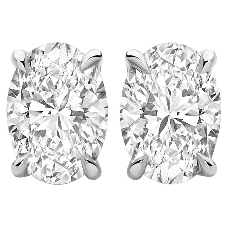 0.50 Carat Oval Brilliant Cut Diamond Stud Earrings 18 Karat White Gold Setting For Sale