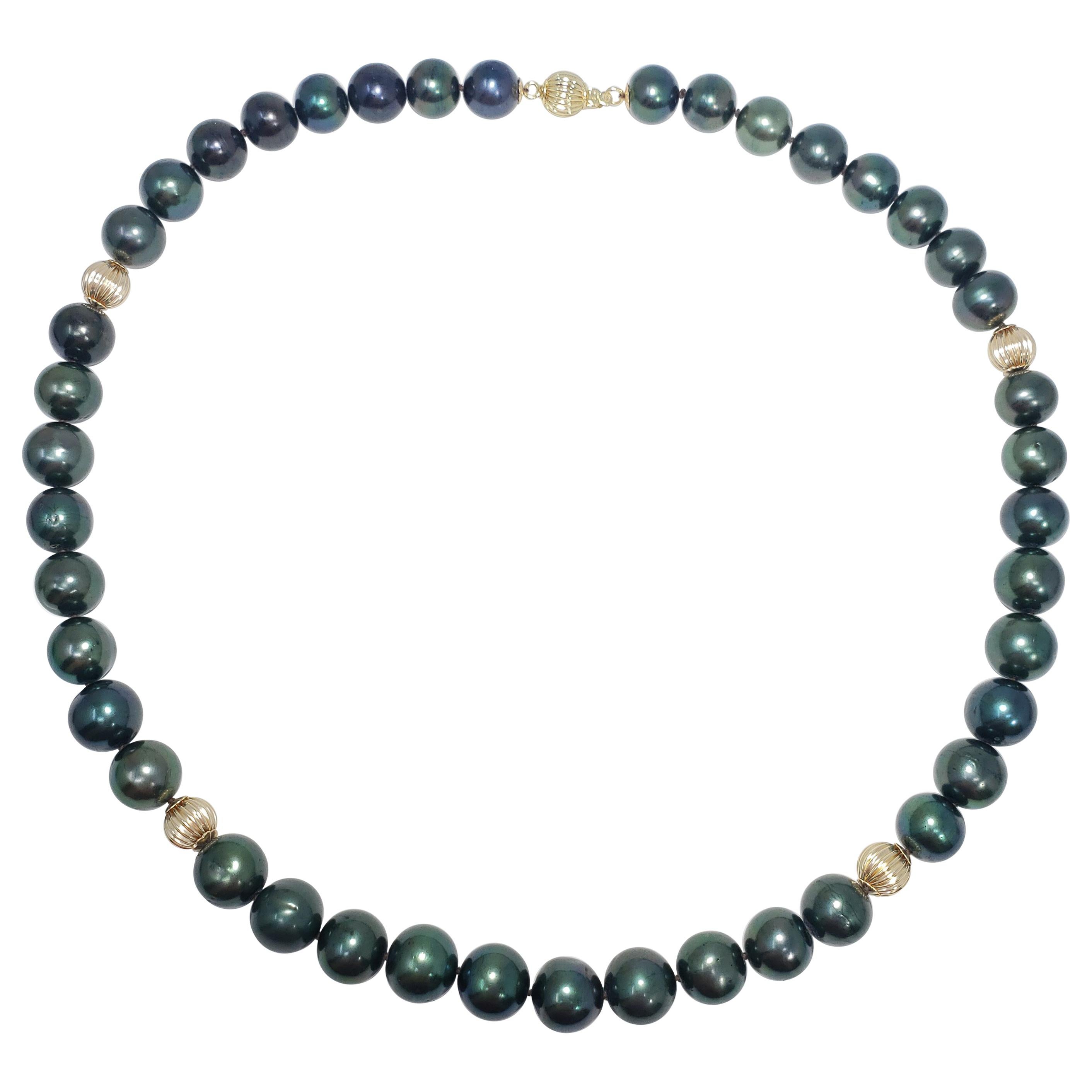 Tahitian Green Pearl Strand Necklace with 14 Karat Yellow Gold Accents and Clasp For Sale