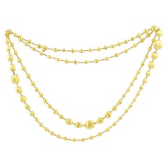 Marco Bicego Africa Collier triple vague graduée en or jaune 18 carats