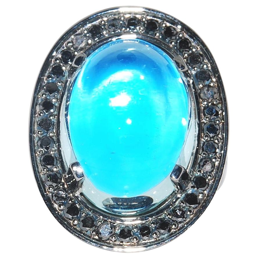 Mystical Aquamarine Cabochon Ring with Black Diamonds in Blackened White Gold For Sale