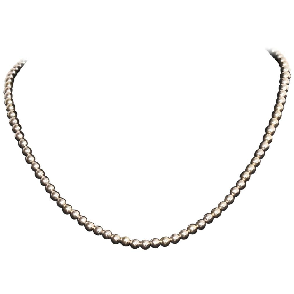 14 Karat Yellow Gold Hollow Bead Necklace For Sale