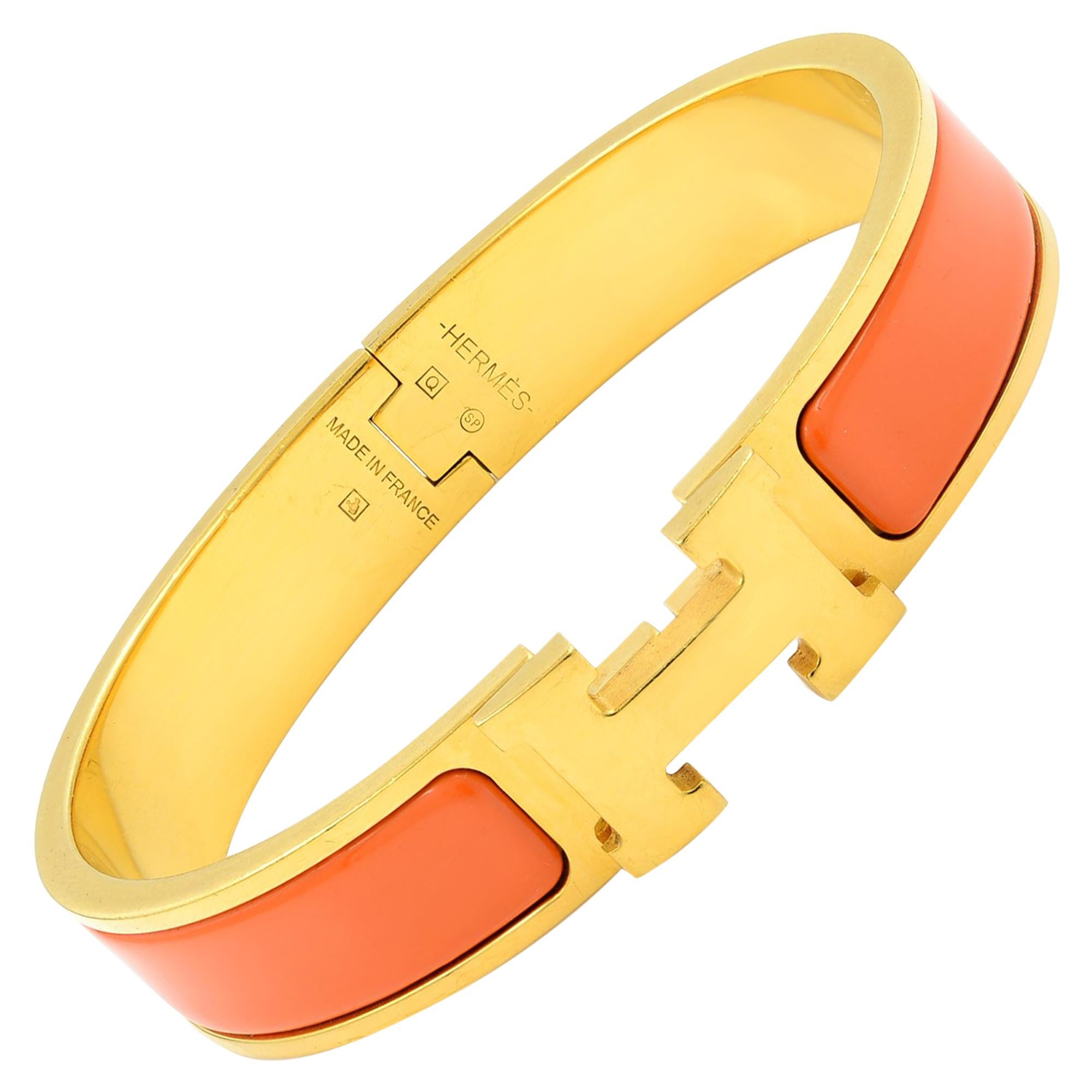 Gold Tone Hermes Orange Clic Clac Bangle Bracelet