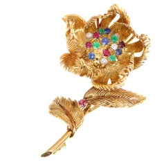 Broche Trembleuse vintage signée Cartier, fleur mobile qui s'ouvre ou se ferme