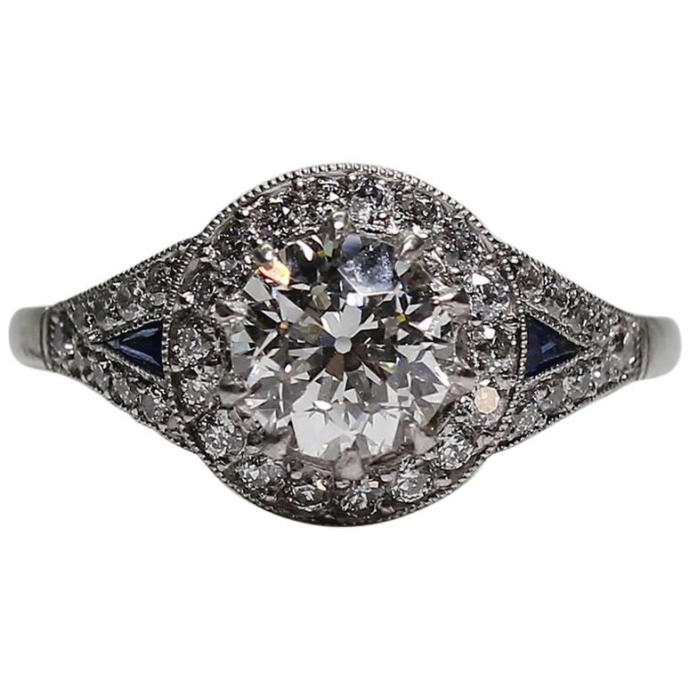 Platinum Art Deco Style Sapphire and Diamond Halo Engagement Ring For Sale