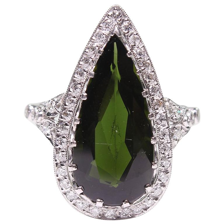 Platinum Victorian Style Antique Green Tourmaline and Diamond Halo Ring For Sale