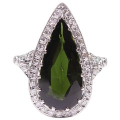 Platinum Victorian Style Antique Green Tourmaline and Diamond Halo Ring
