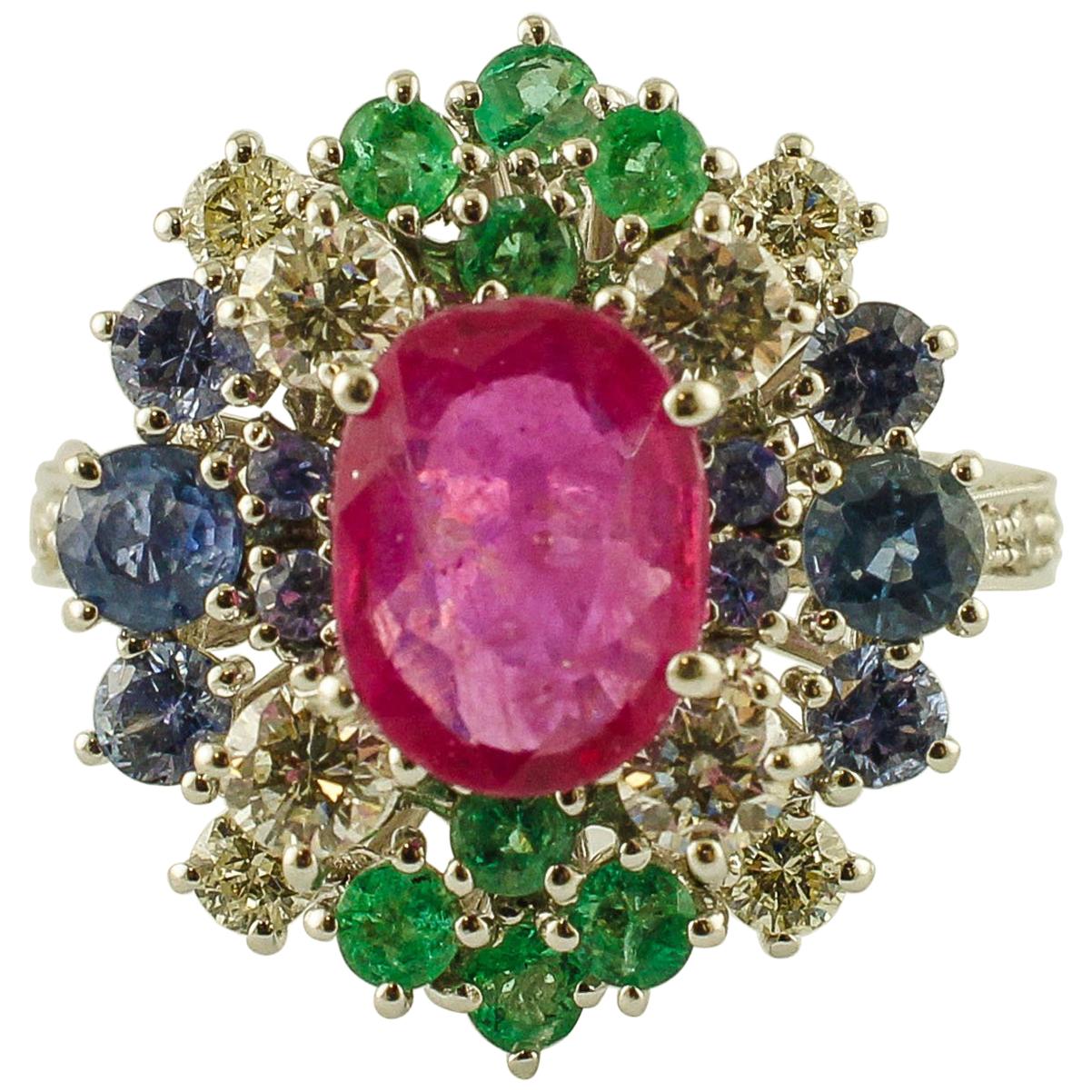 Intense Central Ruby, Diamonds, Emeralds, Blue Sapphires White Gold Cluster Ring