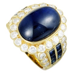 18 Karat Gold Diamond, Sapphire Invisible Setting, and Sapphire Cabochon Large