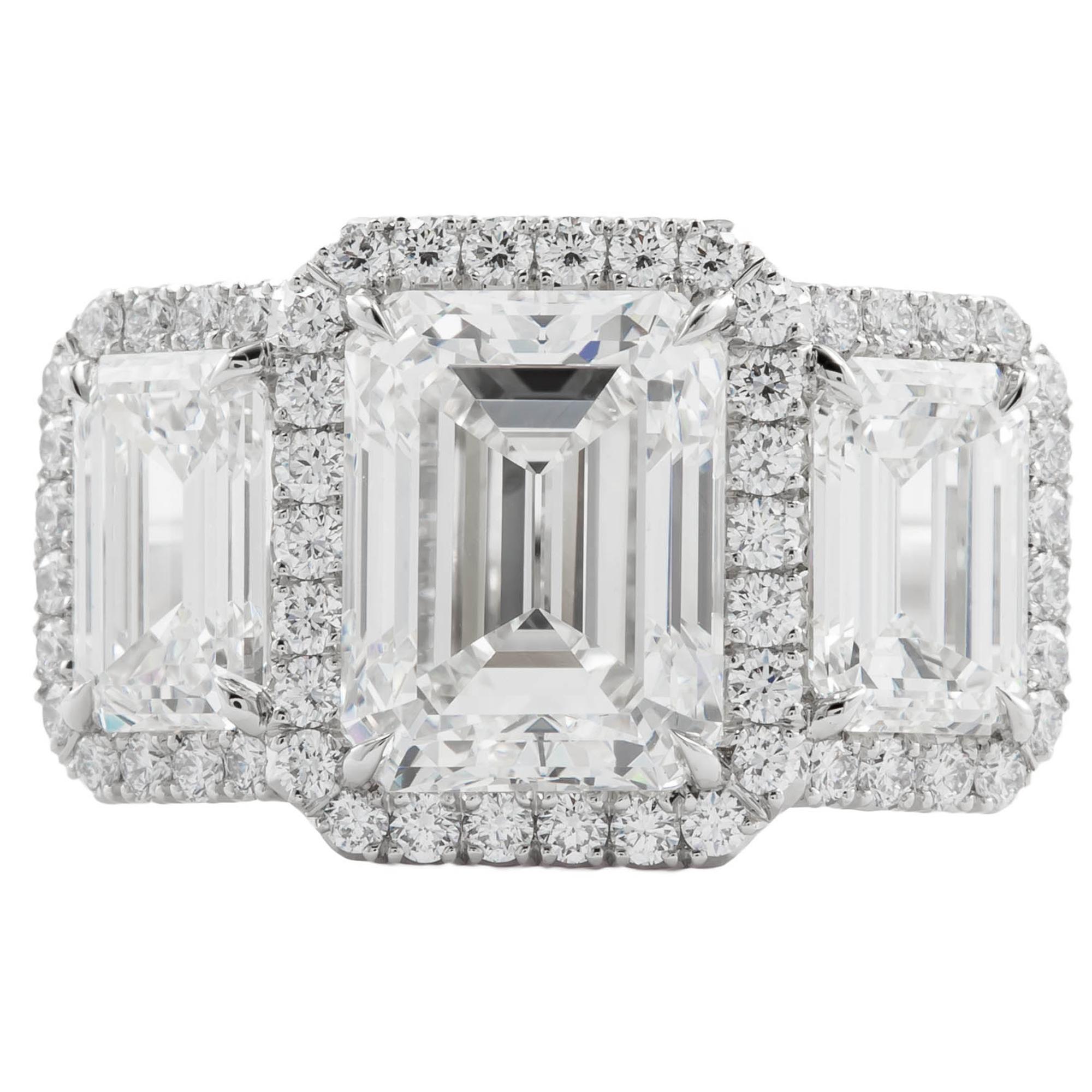 5.31 Carat Three-Stone Emerald Cut Diamond Ring Platinum For Sale
