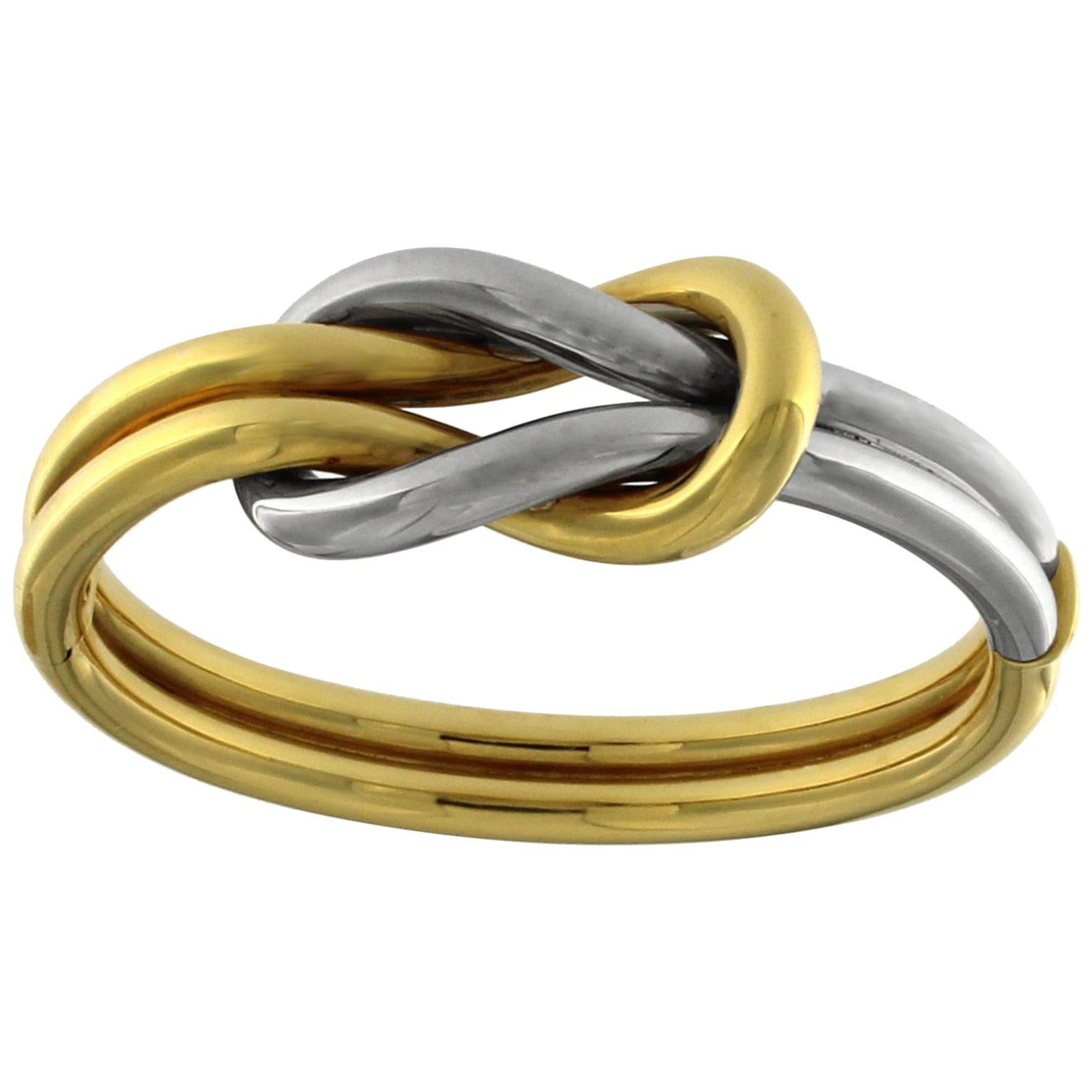 Double Knot Bangle in White and Yellow 18 Karat Gold