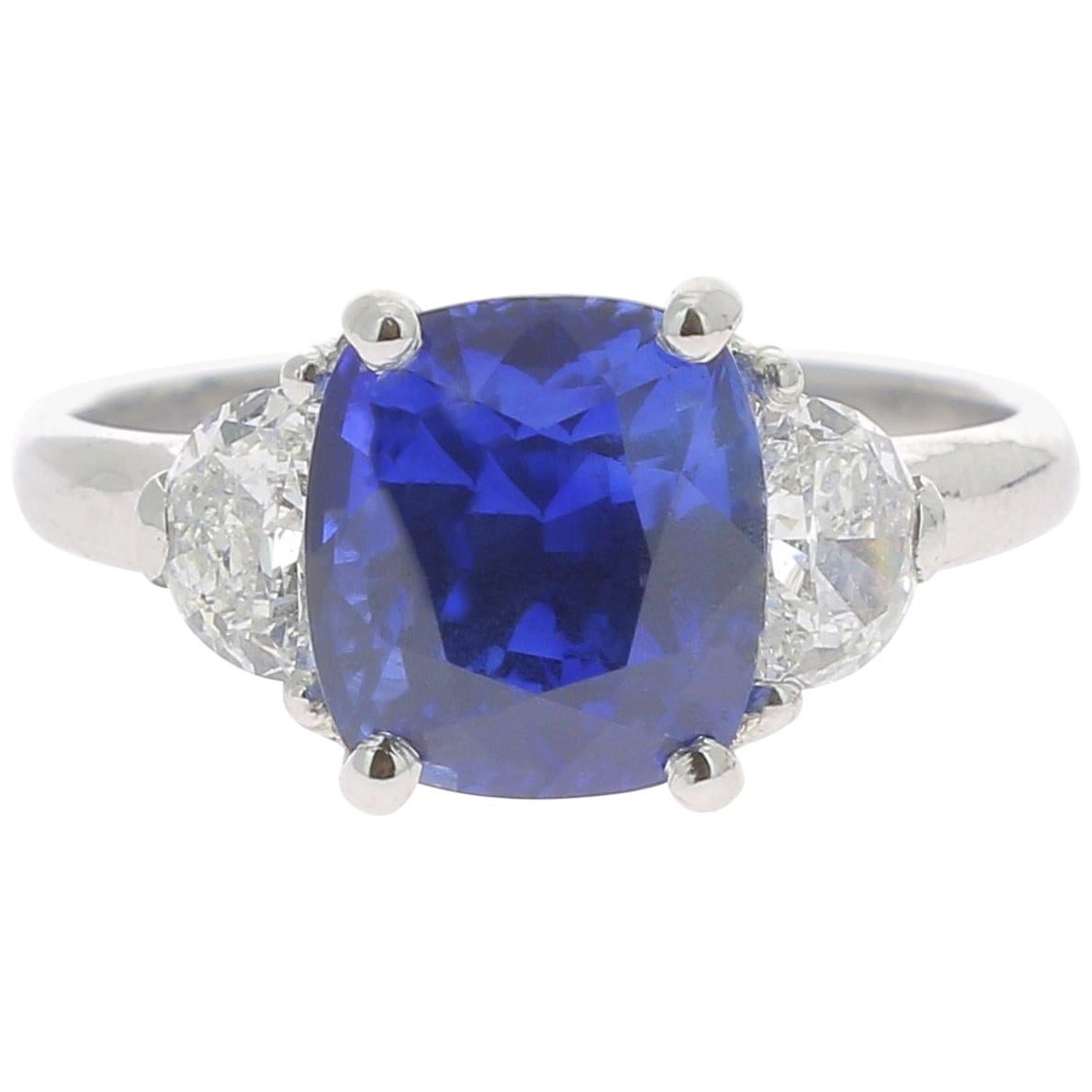 4.73 Carat Blue Sapphire Cocktail Ring Set with Half Moon Diamond No Heated