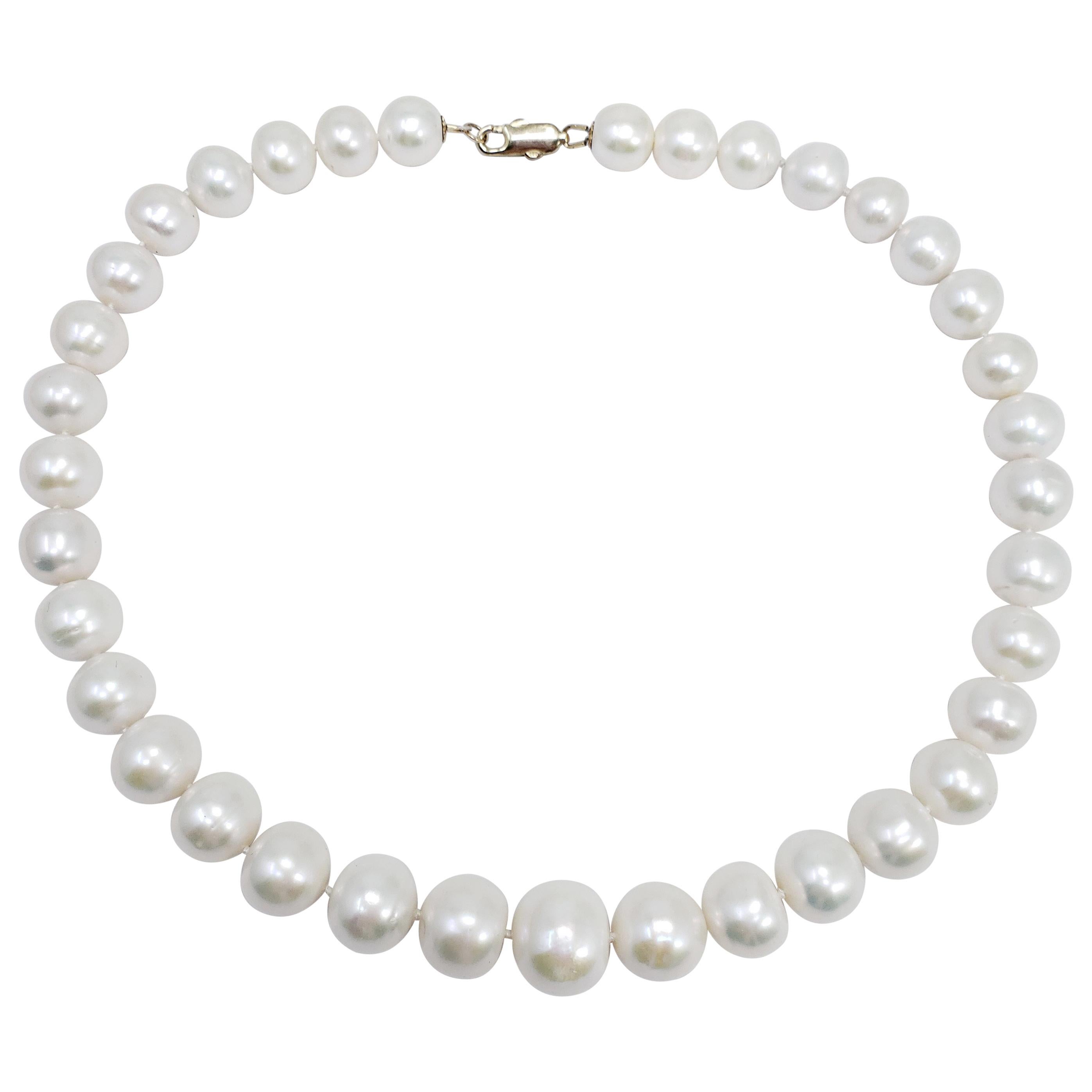 South Sea Pearl Graduated Knotted String Necklace 14 Karat Yellow Gold Clasp For Sale