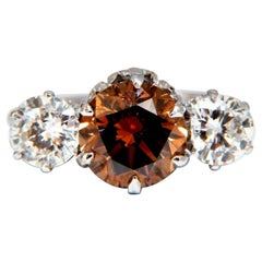 Bague à trois pierres en or 18 carats avec diamants bruns et orange de couleur fantaisie de 3,64 carats certifiés GIA