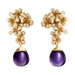Boucles d'oreilles cocktail fleurs de style moderne en or jaune 18 carats avec diamants